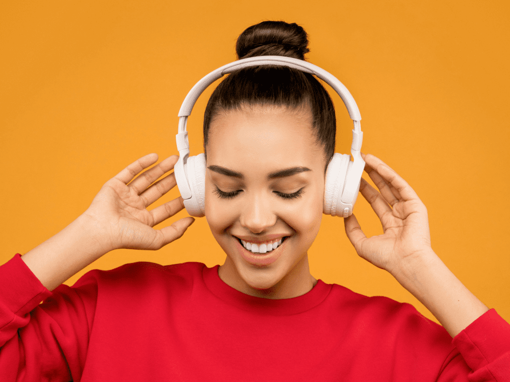 Smiling woman listening to music